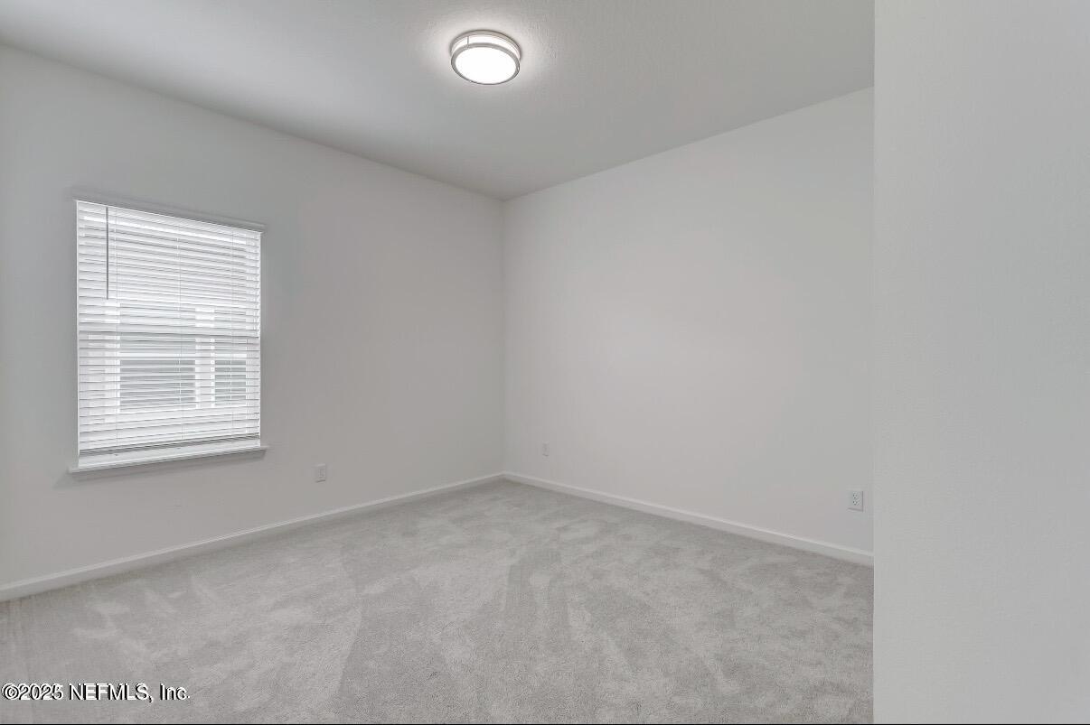 300 Gan Way St. Johns, FL 32259 - Photo 30 of 36 an empty room with a window