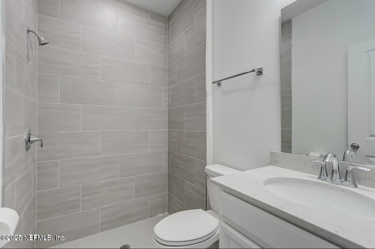 300 Gan Way St. Johns, FL 32259 - Photo 31 of 36 a bathroom with a sink toilet and shower
