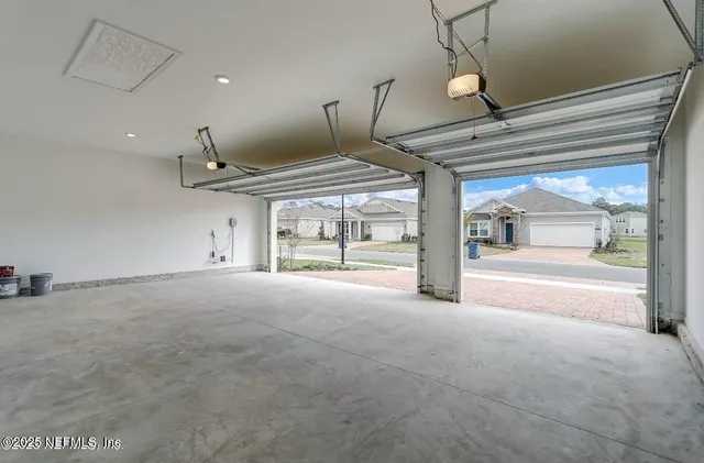 a view of a room with sliding glass door and mountain view