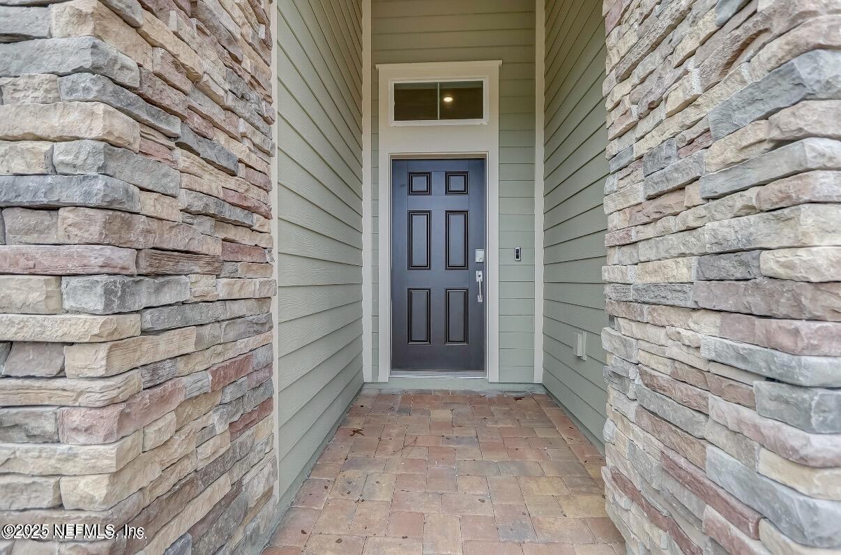 300 Gan Way St. Johns, FL 32259 - Photo 4 of 36 a view of front door of house