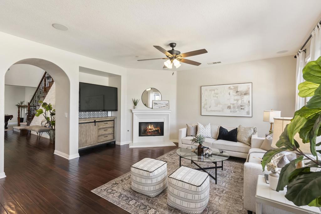 1407 Eclipse Drive San Marcos, CA 92078 - Photo 11 of 32 a living room with furniture a rug and a flat screen tv
