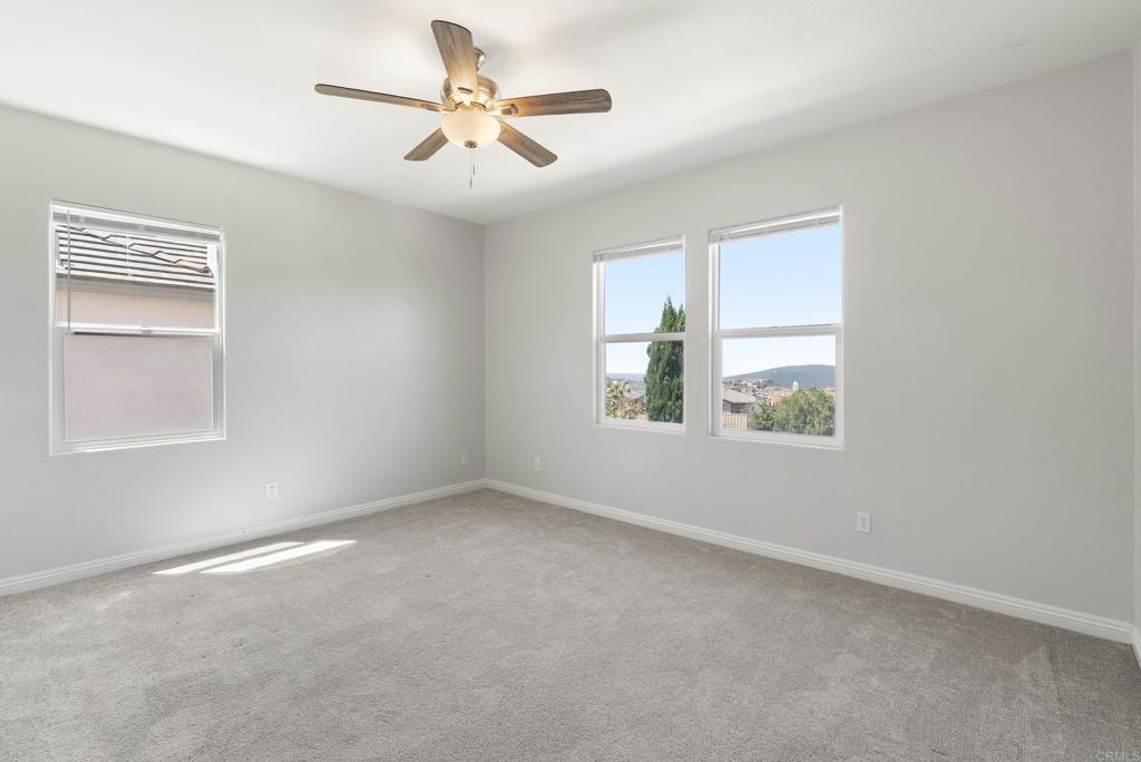 1407 Eclipse Drive San Marcos, CA 92078 - Photo 20 of 32 a view of an empty room with a window