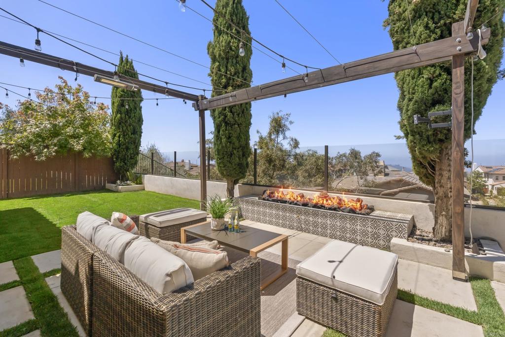 1407 Eclipse Drive San Marcos, CA 92078 - Photo 29 of 32 a view of an outdoor sitting area with a couch