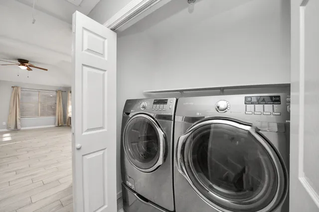a utility room with dryer and washer