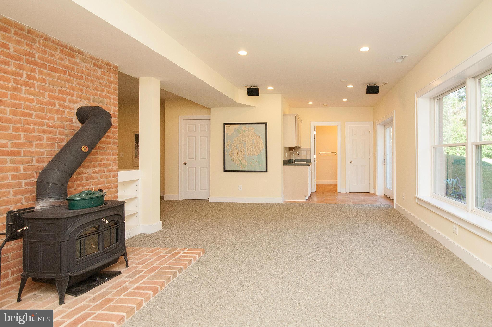 39436 Rodeffer Road Lovettsville, VA 20180 - Photo 23 of 30 Family Room on Lower Level w/Wood Stove & Wet Bar