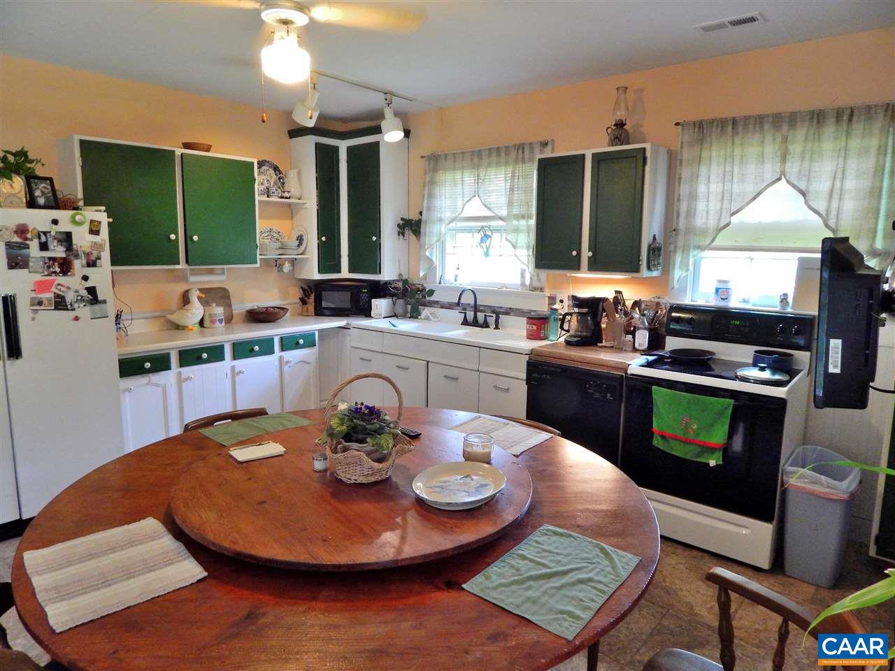 5298 Poindexter Road Louisa, VA 23093 - Photo 11 of 20 a dining room with furniture and wooden floor