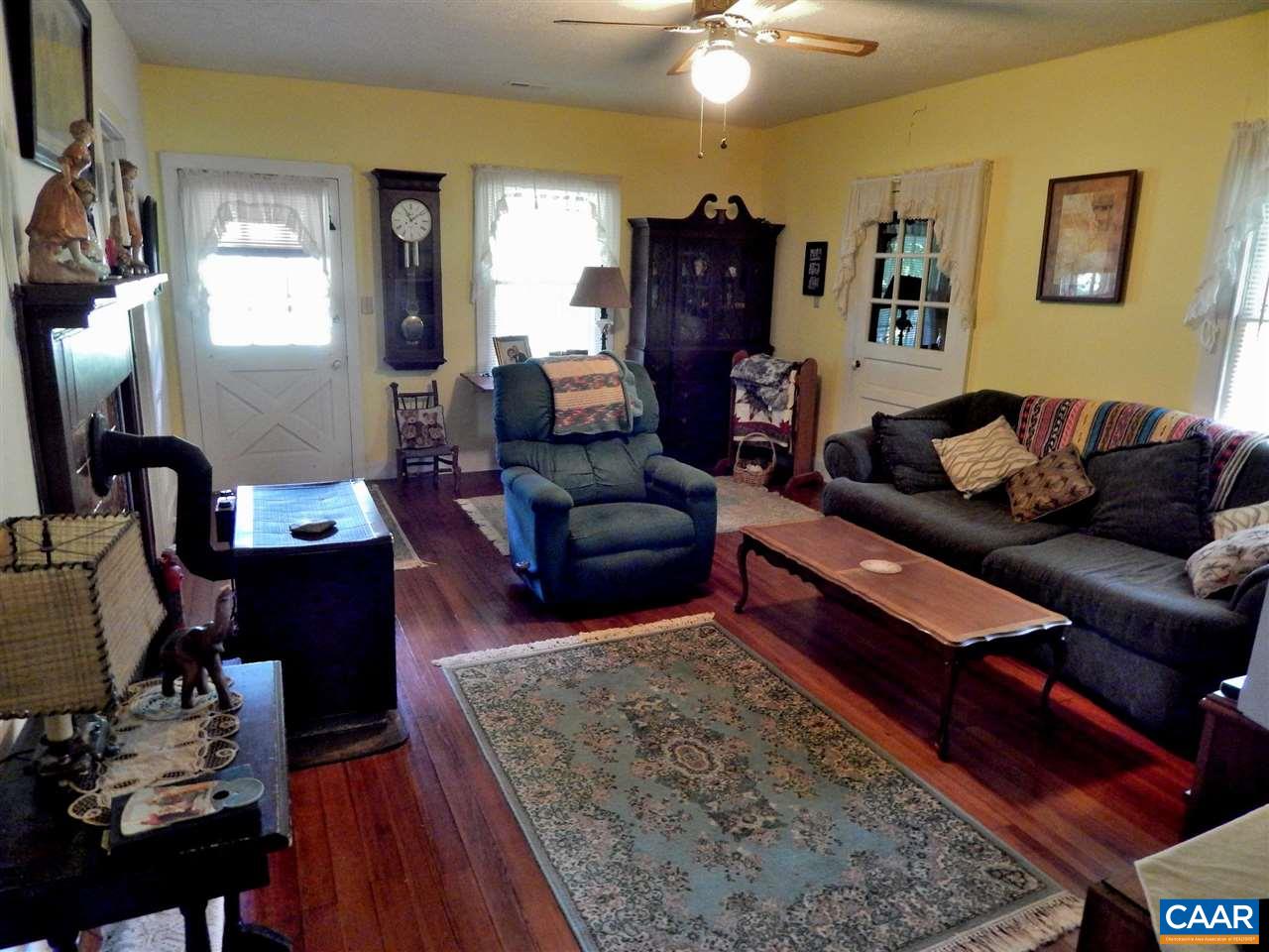 5298 Poindexter Road Louisa, VA 23093 - Photo 9 of 20 a living room with furniture and a wooden floor