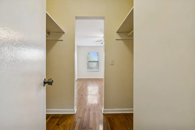 a bathroom with a glass shower door