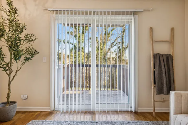 a view of a door and a window
