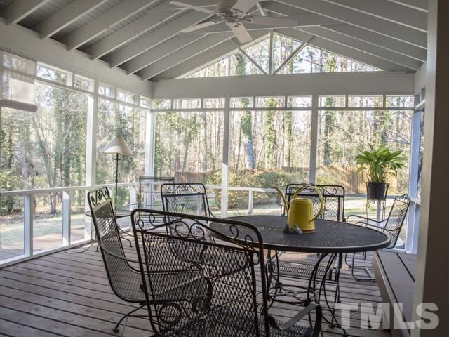 3000 Buckingham Road Durham, NC 27707 - Photo 22 of 25 a dining room with furniture a chandelier and wooden floor