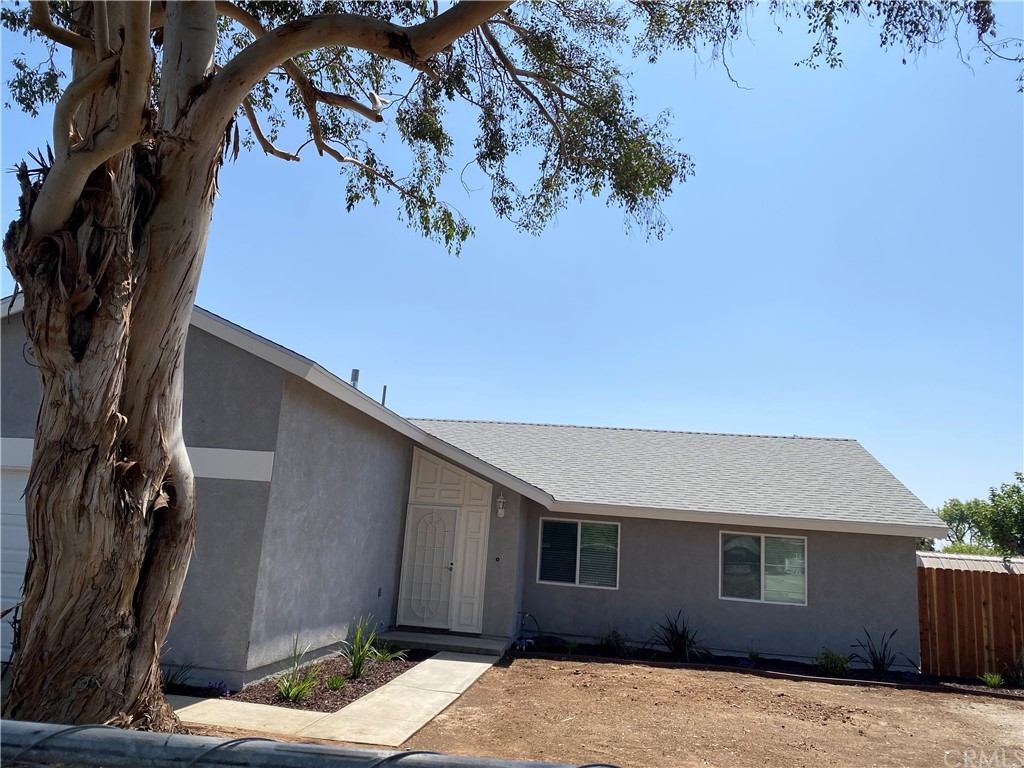 6776 Biscayne Avenue Riverside, CA 92503 - Photo 1 of 1 a front view of a house with a yard