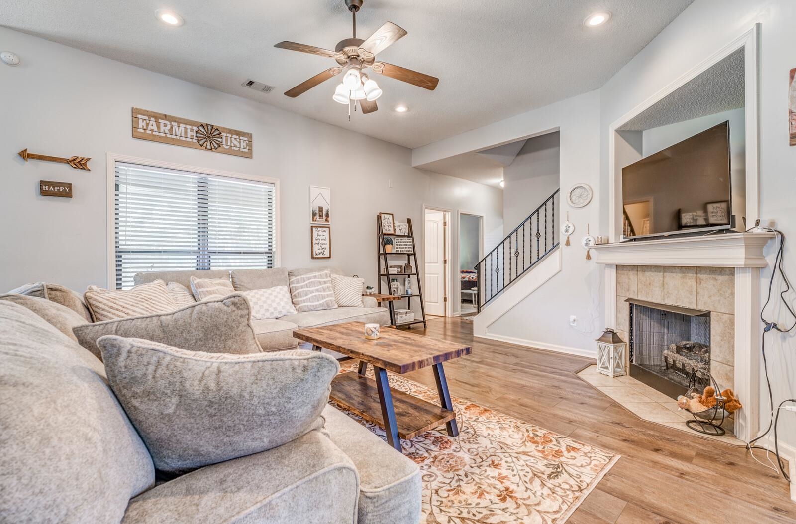 4671 Hampton Ridge Lane Bartlett, TN 38002 - Photo 12 of 40 Spacious living area featuring wood-finish flooring, recessed lighting, and a ceiling fan
