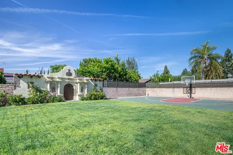 a front view of house with a yard
