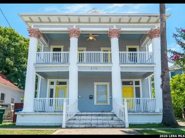 a front view of a house with a porch