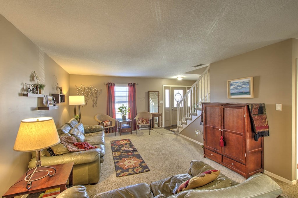 2261 Hoyt Court Decatur, IL 62526 - Photo 3 of 26 a living room with furniture and a flat screen tv