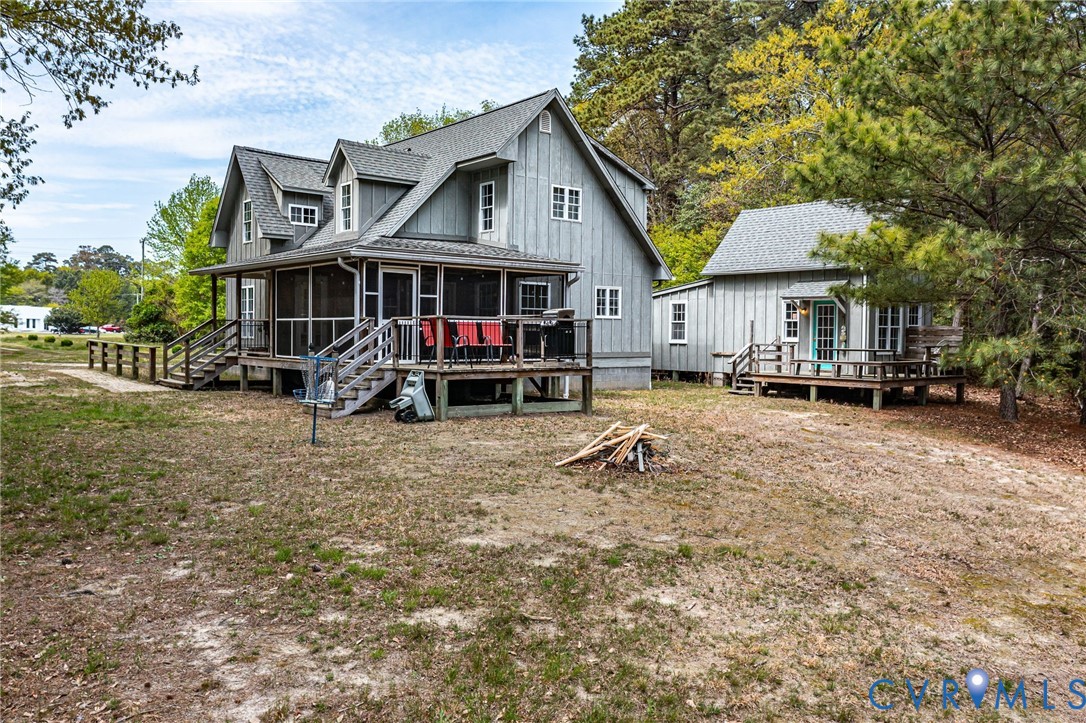 193 Deep Water Lane Reedville, VA 22539 - Photo 55 of 84 The property features a main dwelling with a scree