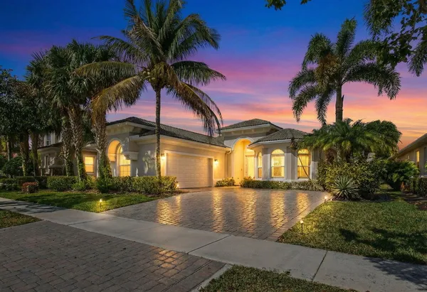 a front view of a house with a ocean view
