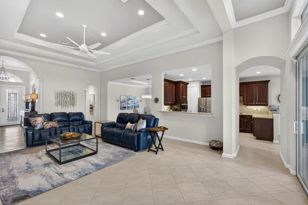 a kitchen with a sink and stainless steel appliances