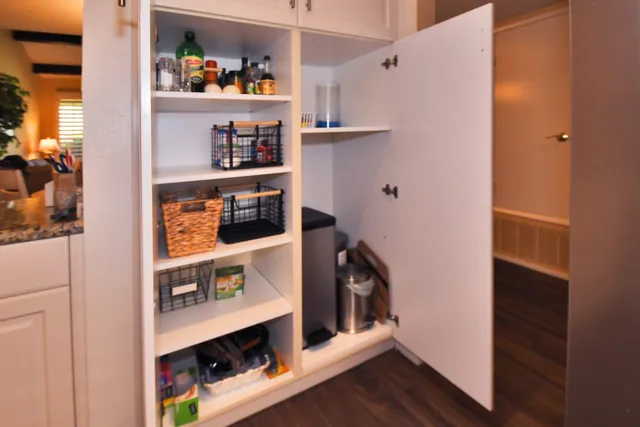 a room with storage and utility