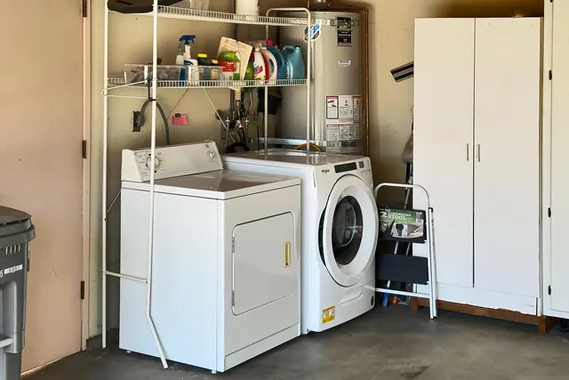 a utility room with dryer and washer