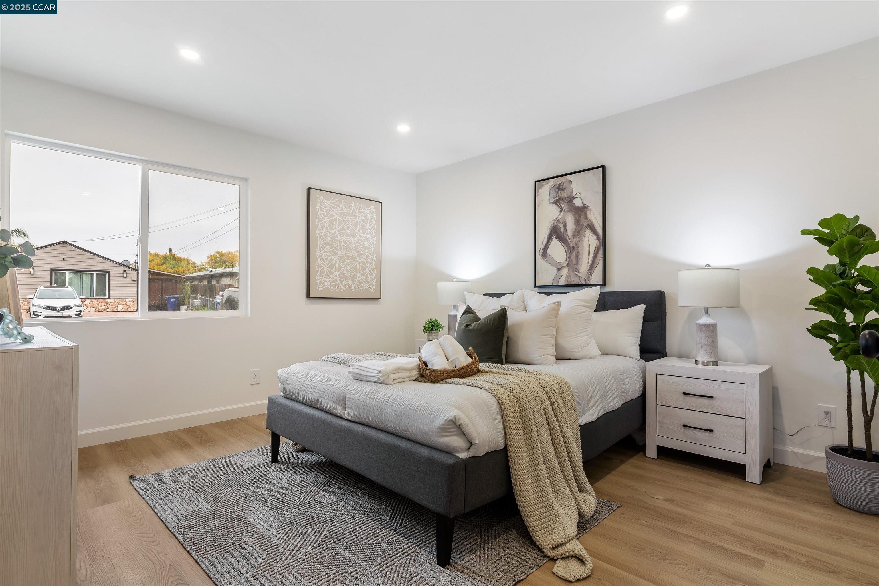 330 Warren Way Pittsburg, CA 94565 - Photo 21 of 37 a bedroom with a bed and a window