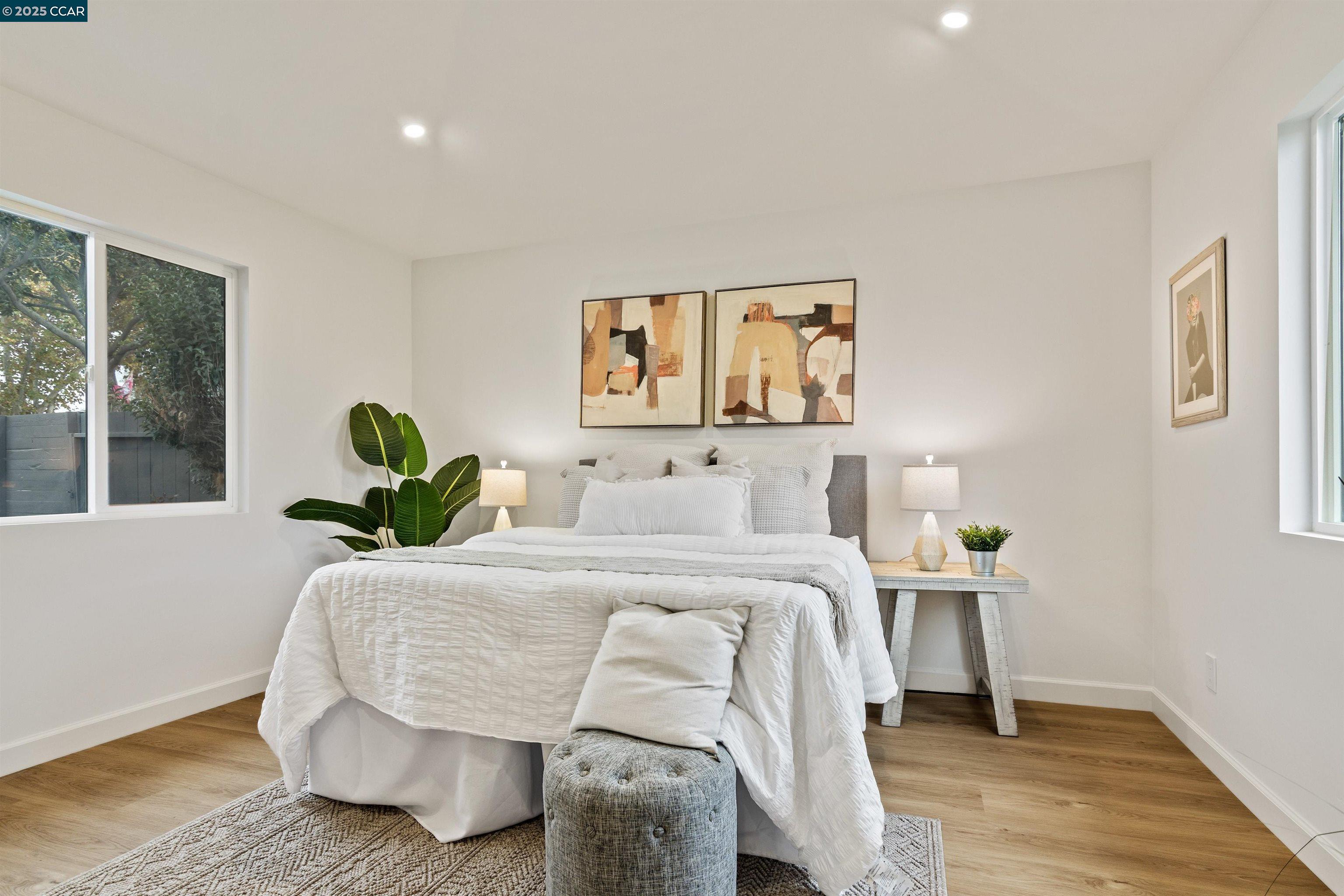 330 Warren Way Pittsburg, CA 94565 - Photo 29 of 37 a bed sitting in a bedroom next to a window