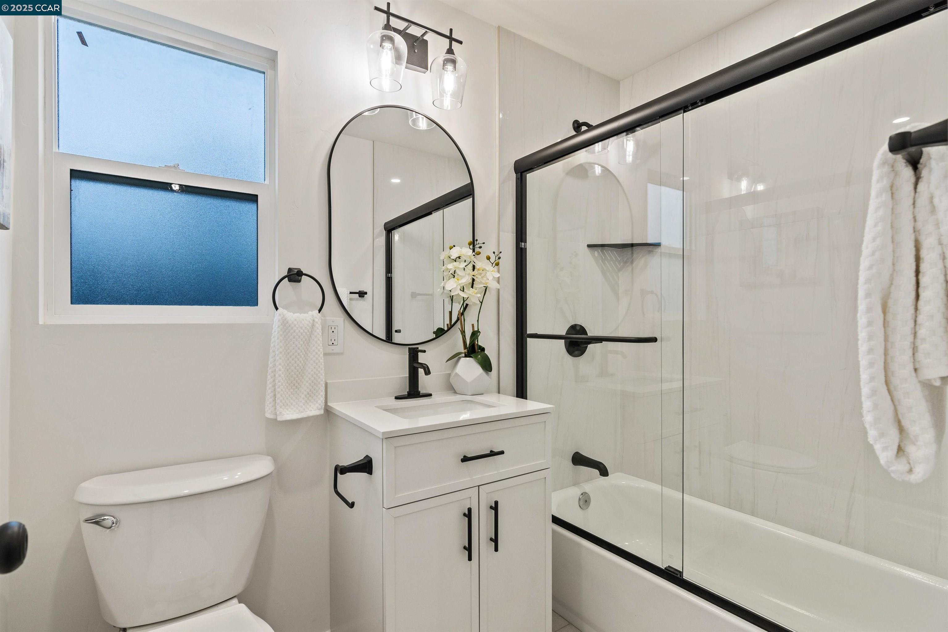 330 Warren Way Pittsburg, CA 94565 - Photo 33 of 37 a bathroom with a sink toilet and shower