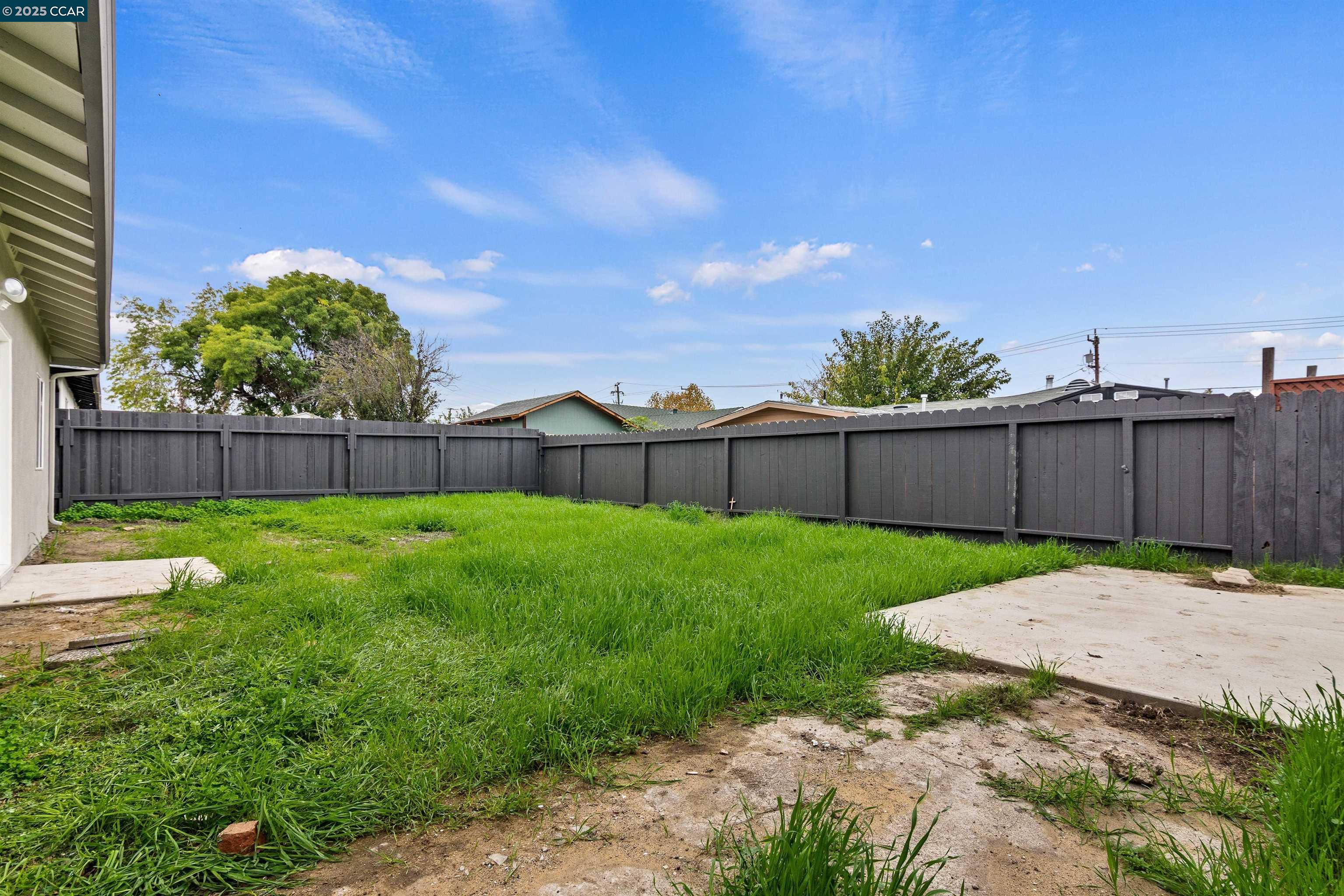 330 Warren Way Pittsburg, CA 94565 - Photo 36 of 37 a view of backyard with wooden fence