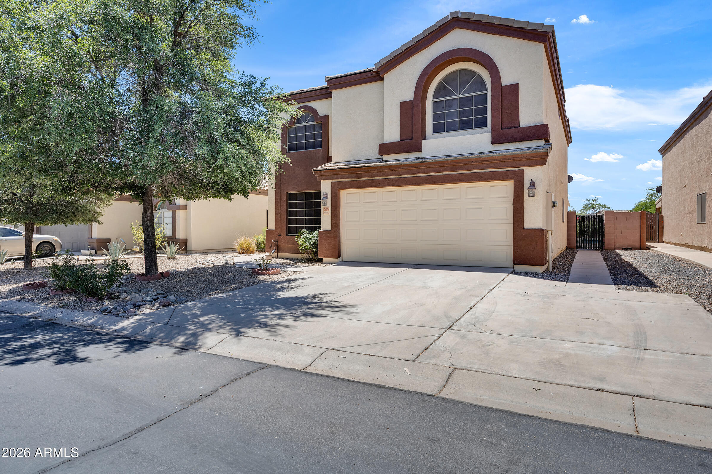 5725 East Good Pasture Lane Florence, AZ 85132 - Photo 2 of 40 a view of a house with a yard