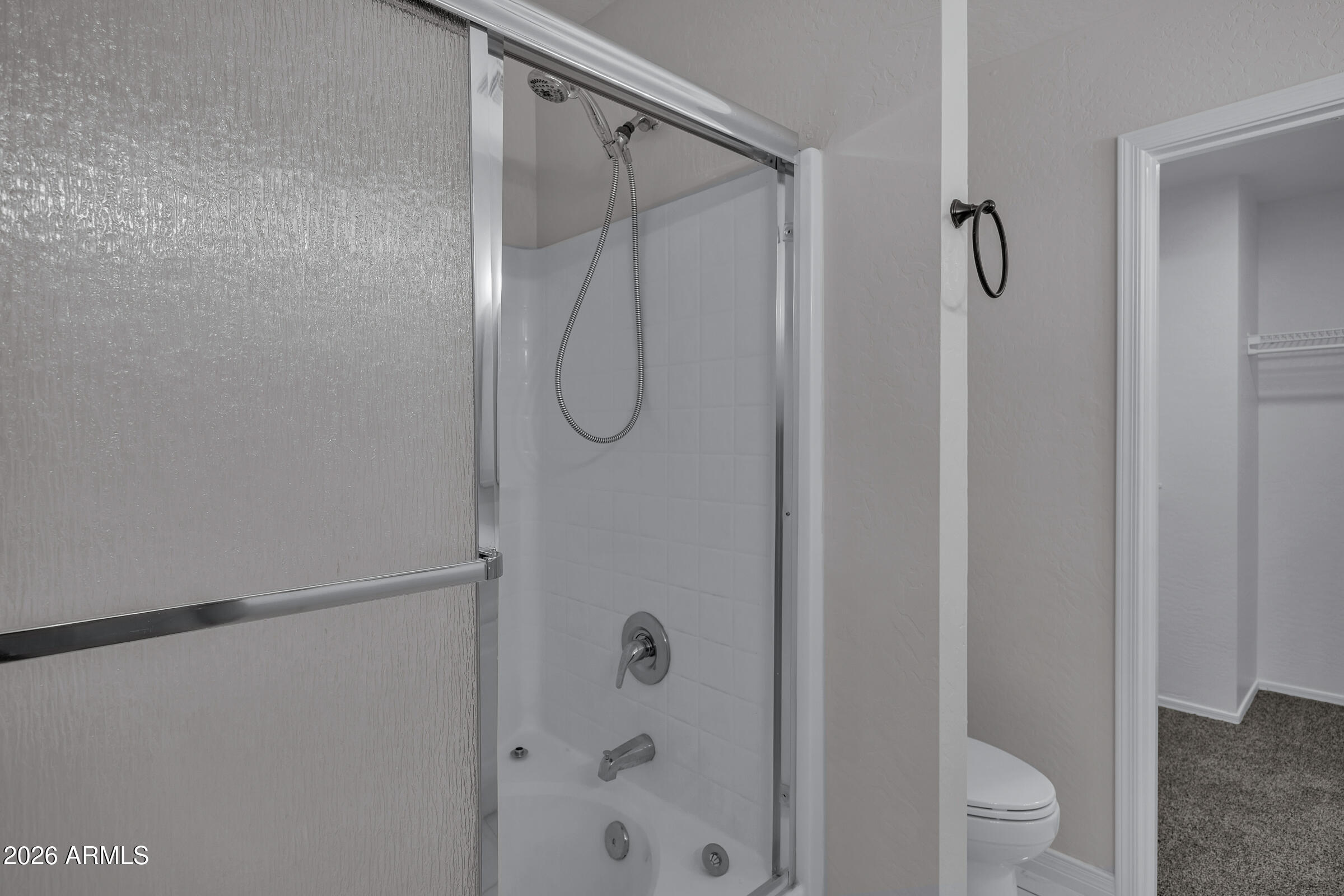 5725 East Good Pasture Lane Florence, AZ 85132 - Photo 31 of 40 a bathroom with a shower
