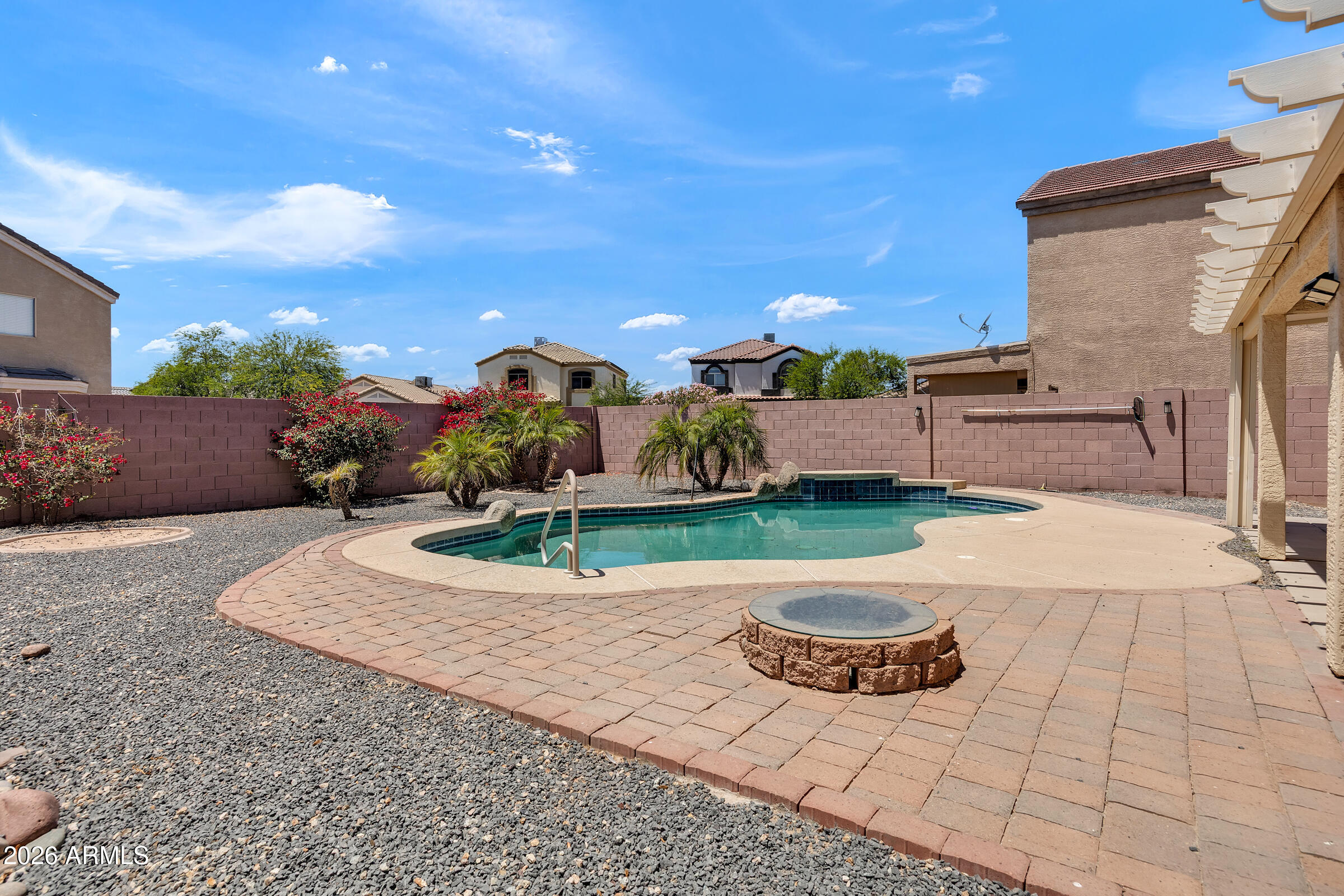 5725 East Good Pasture Lane Florence, AZ 85132 - Photo 36 of 40 a view of a backyard with sitting area