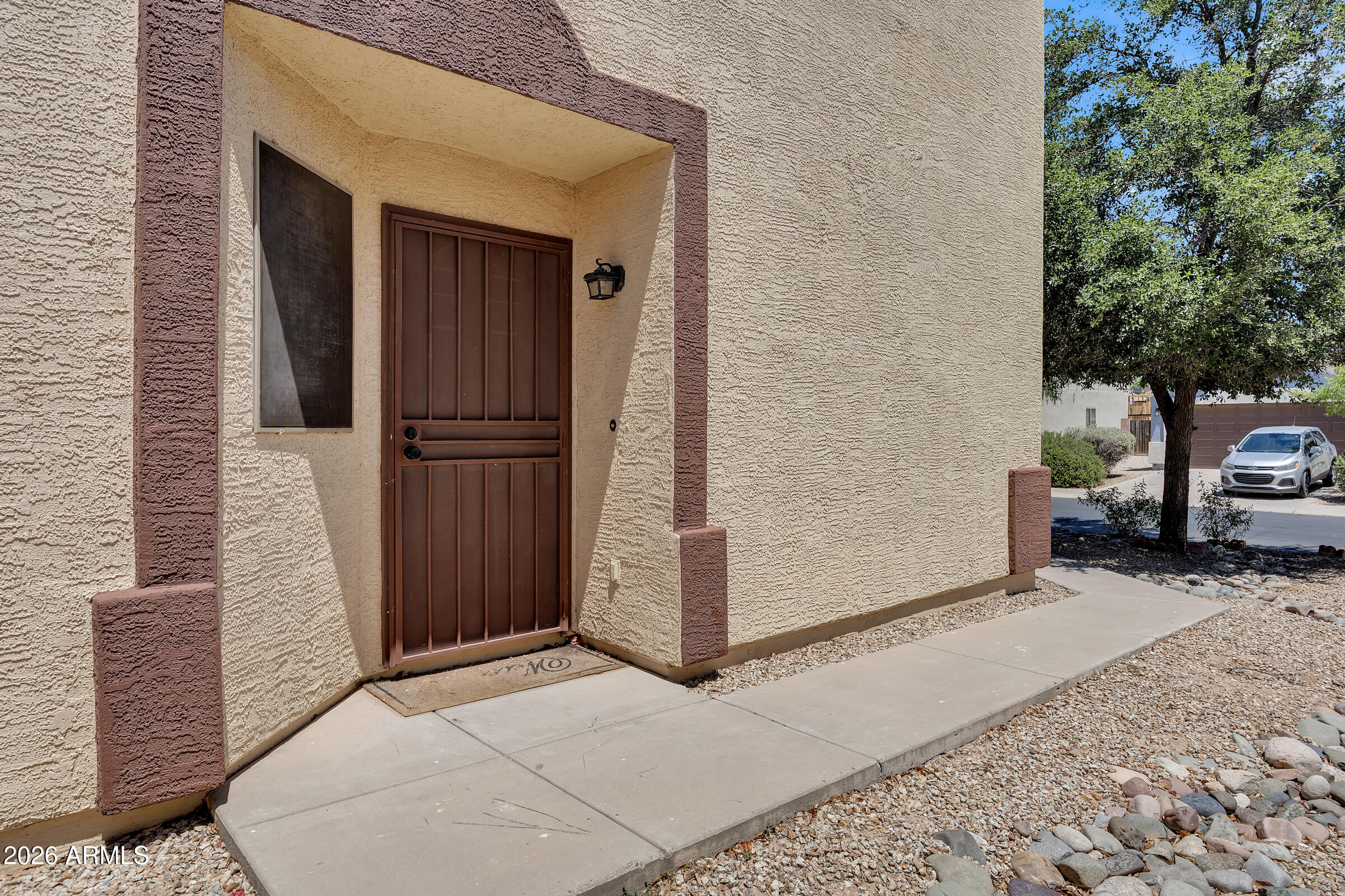 5725 East Good Pasture Lane Florence, AZ 85132 - Photo 4 of 40 a view of a wooden door of the house