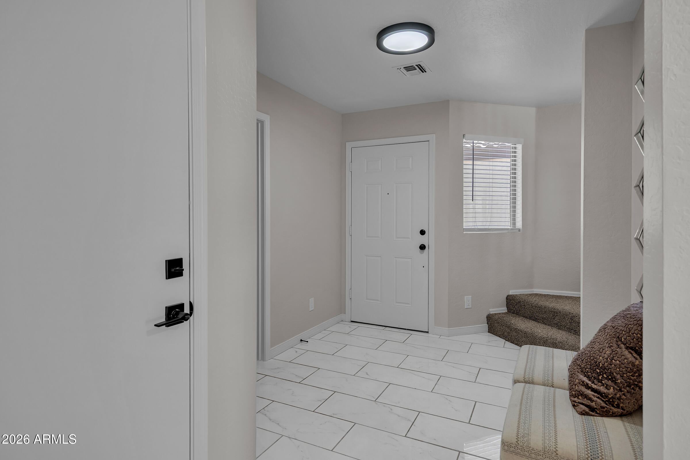 5725 East Good Pasture Lane Florence, AZ 85132 - Photo 6 of 40 a view of livingroom with furniture and closet