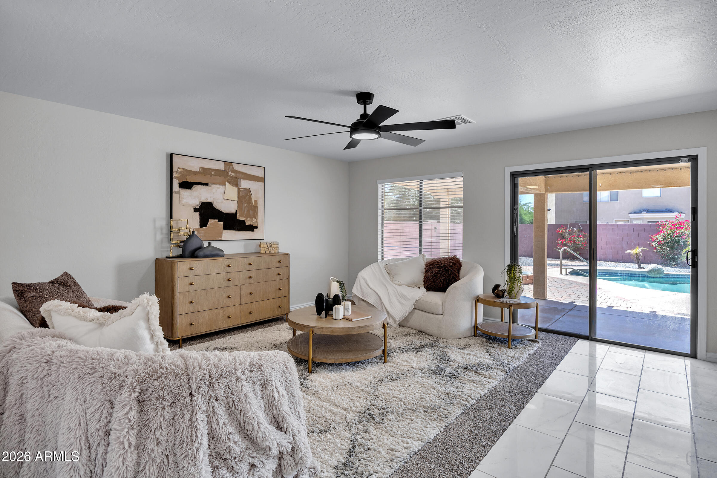 5725 East Good Pasture Lane Florence, AZ 85132 - Photo 9 of 40 a living room with furniture and large windows