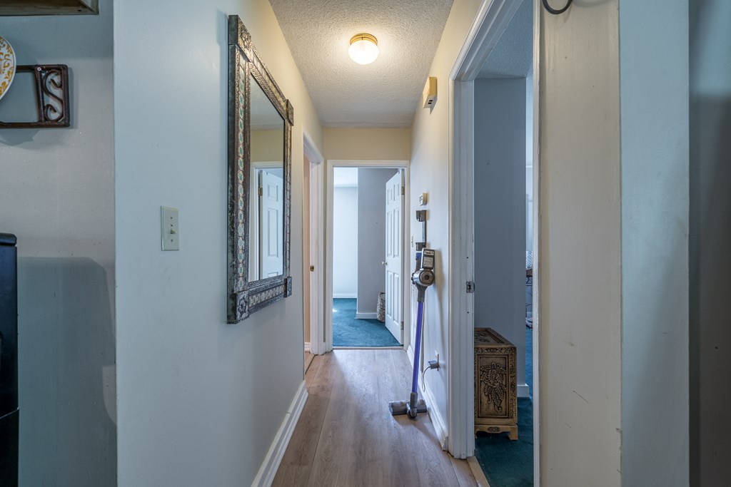 1813 John Smith Road East Blairsville, GA 30512 - Photo 15 of 41 a view of hallway with wooden floor