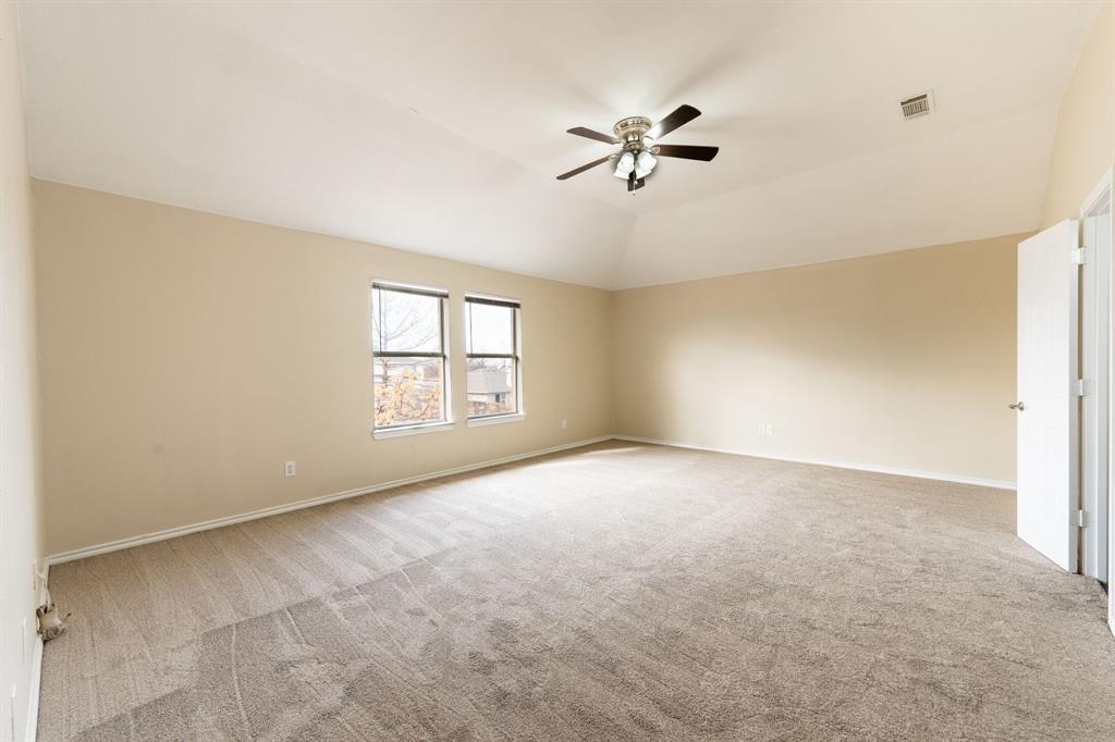 1101 Halifax Lane Forney, TX 75126 - Photo 19 of 32 a view of an empty room with a window
