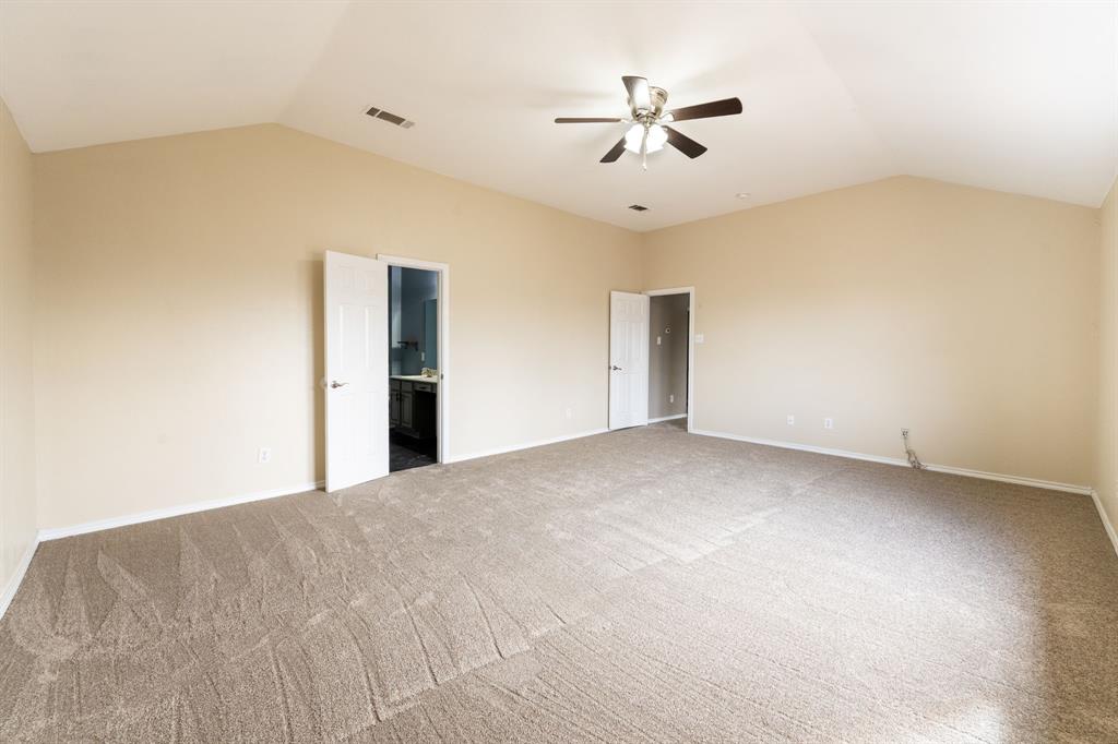 1101 Halifax Lane Forney, TX 75126 - Photo 20 of 32 a view of an empty room with chandelier fan