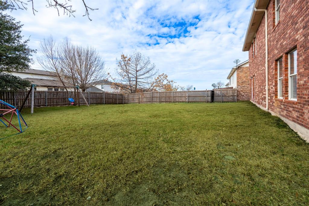 1101 Halifax Lane Forney, TX 75126 - Photo 32 of 32 a view of a field with a big yard