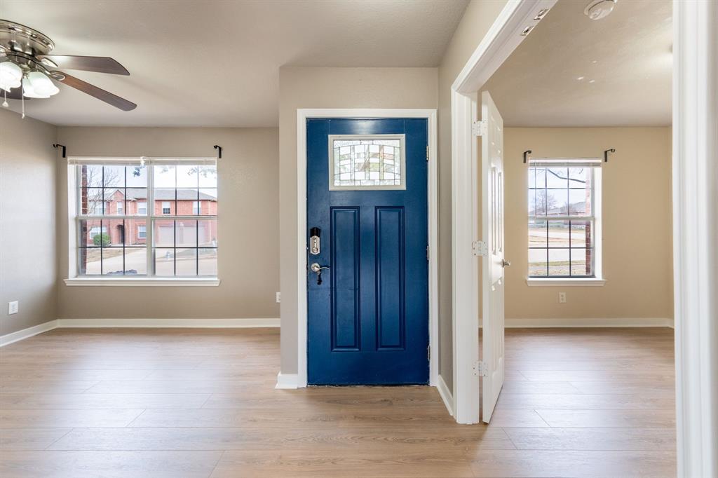 1101 Halifax Lane Forney, TX 75126 - Photo 4 of 32 a view of livingroom with hardwood floor and window