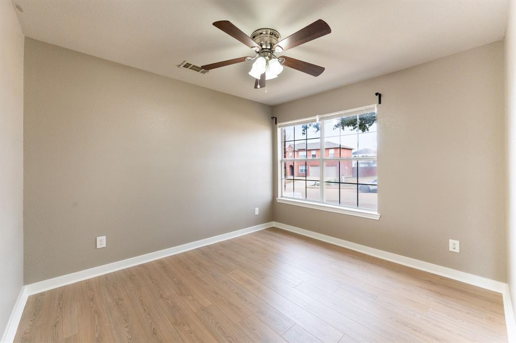 1101 Halifax Lane Forney, TX 75126 - Photo 6 of 32 a view of an empty room with a window