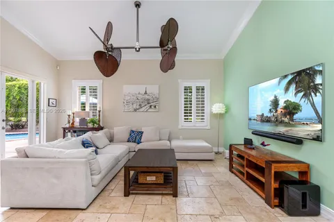 a bedroom with furniture and a mirror