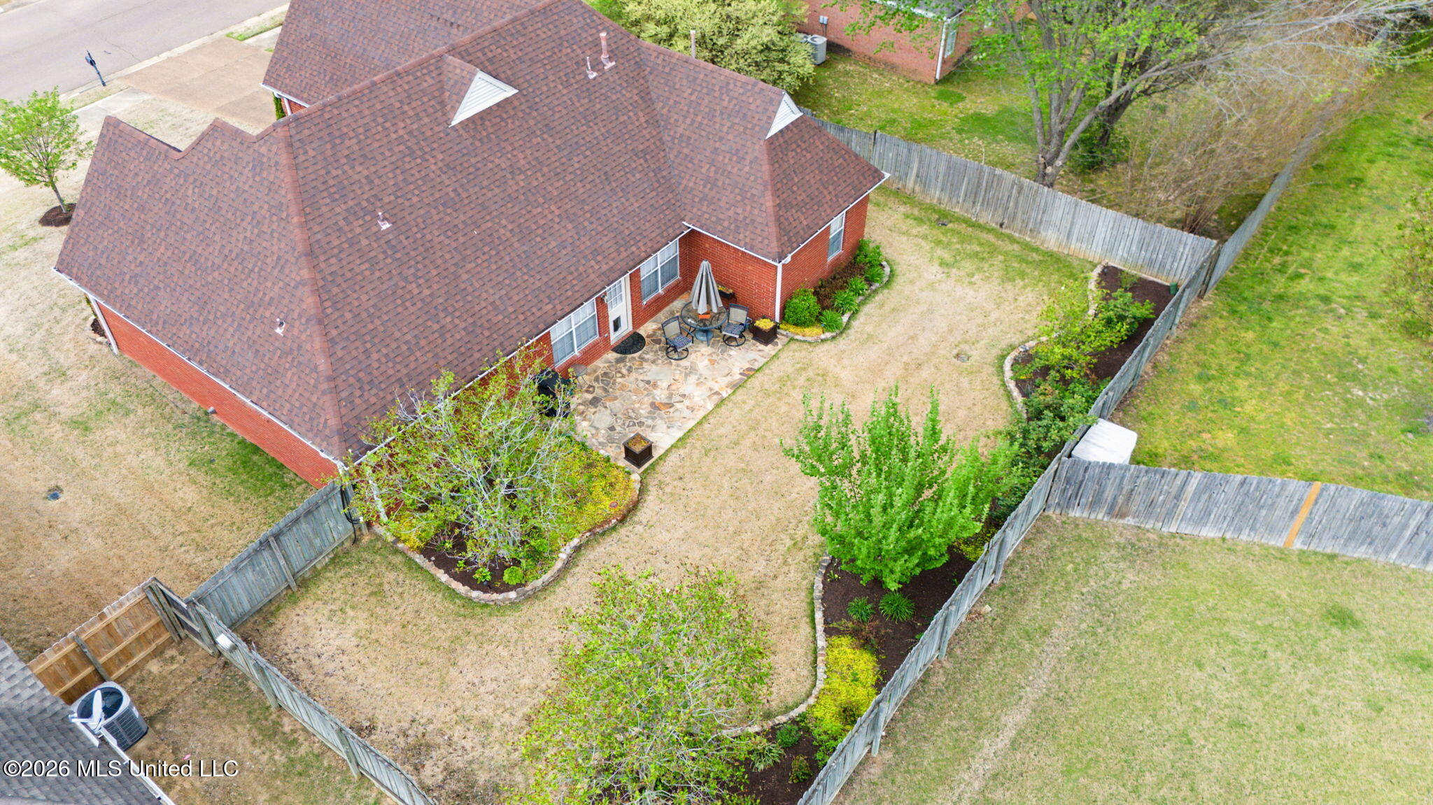 7740 Meadow Ridge Lane Olive Branch, MS 38654 - Photo 38 of 40 Landscaped backyard