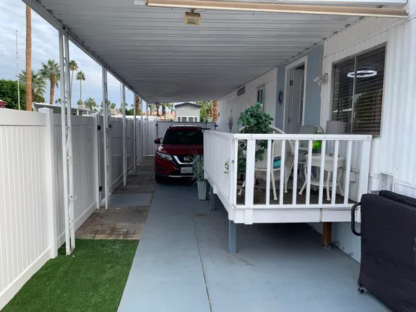 a table and chairs in a patio