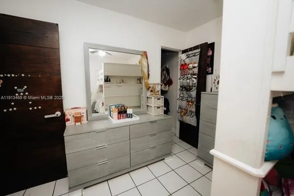 a room with furniture and flat screen tv