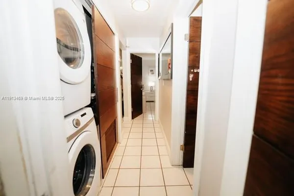 a bathroom with a sink vanity and a mirror