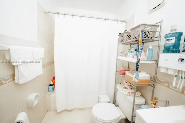 a storage room with washer and dryer