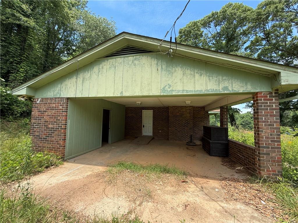 5075 Karr Road Cumming, GA 30040 - Photo 14 of 38 a front view of a house with garden