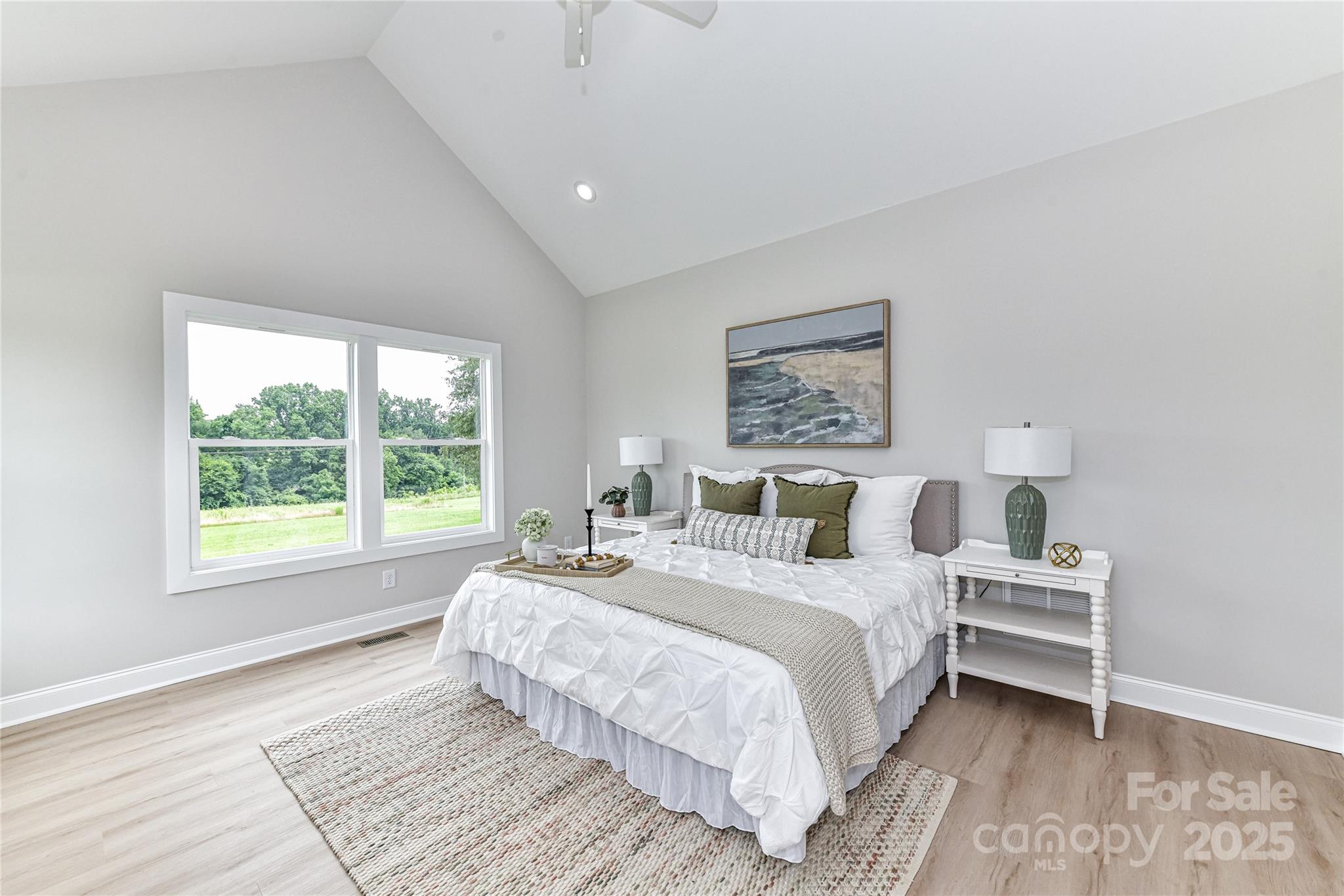 181 Lone Pine Road Statesville, NC 28625 - Photo 20 of 42 a bedroom with a large bed and a window