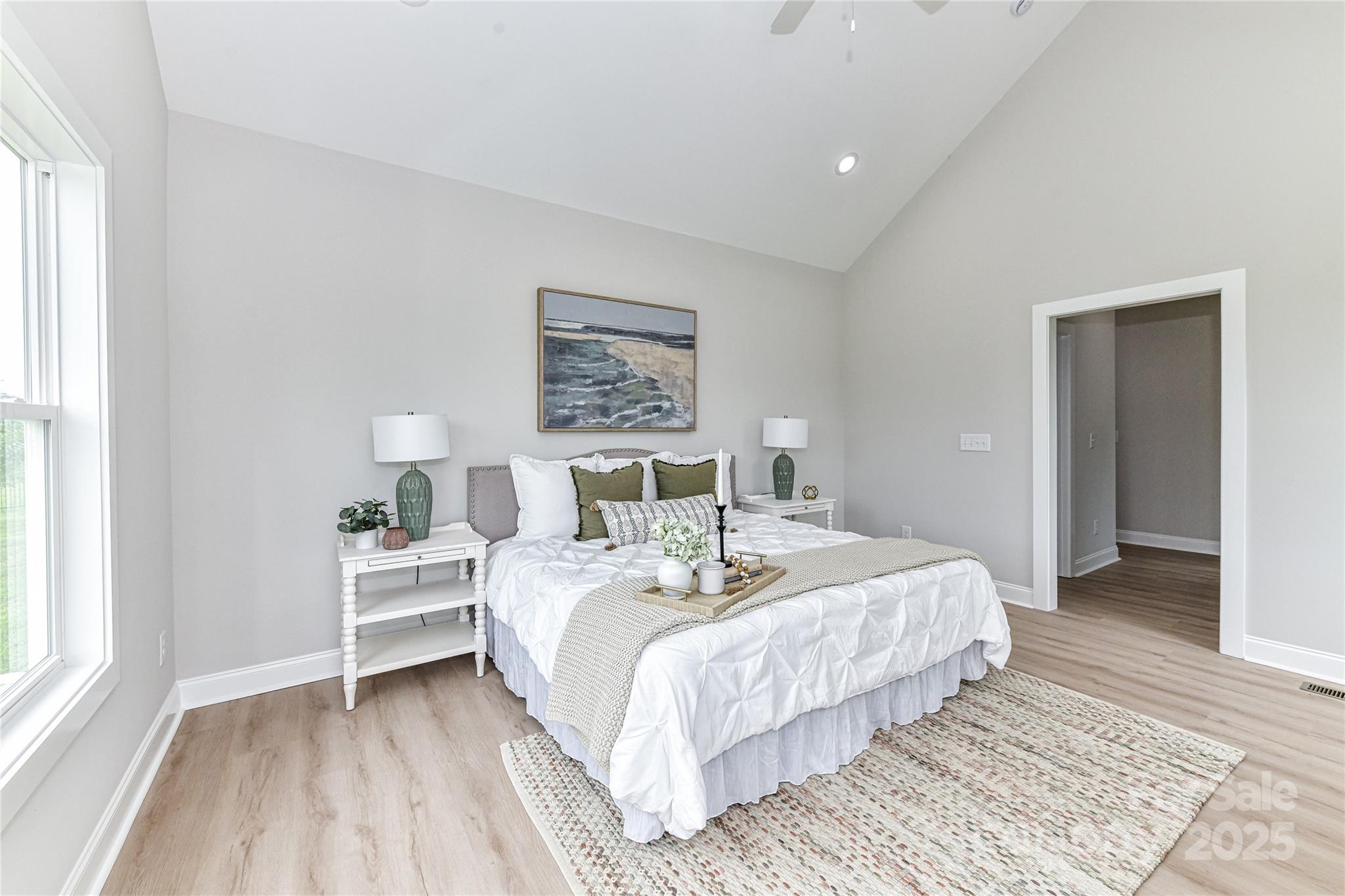 181 Lone Pine Road Statesville, NC 28625 - Photo 21 of 42 a bedroom with a bed and a window
