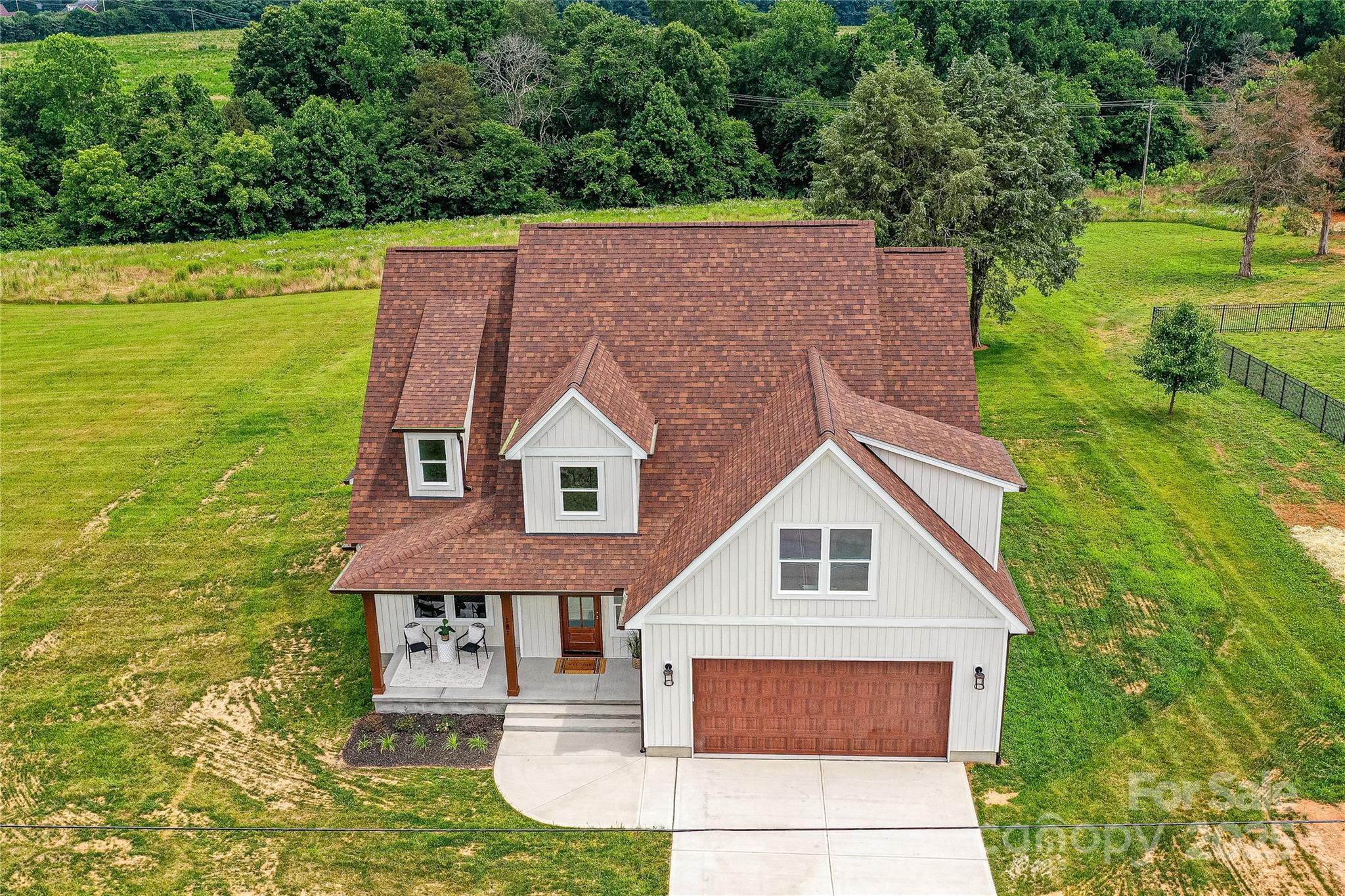 181 Lone Pine Road Statesville, NC 28625 - Photo 38 of 42 a aerial view of a house with a yard